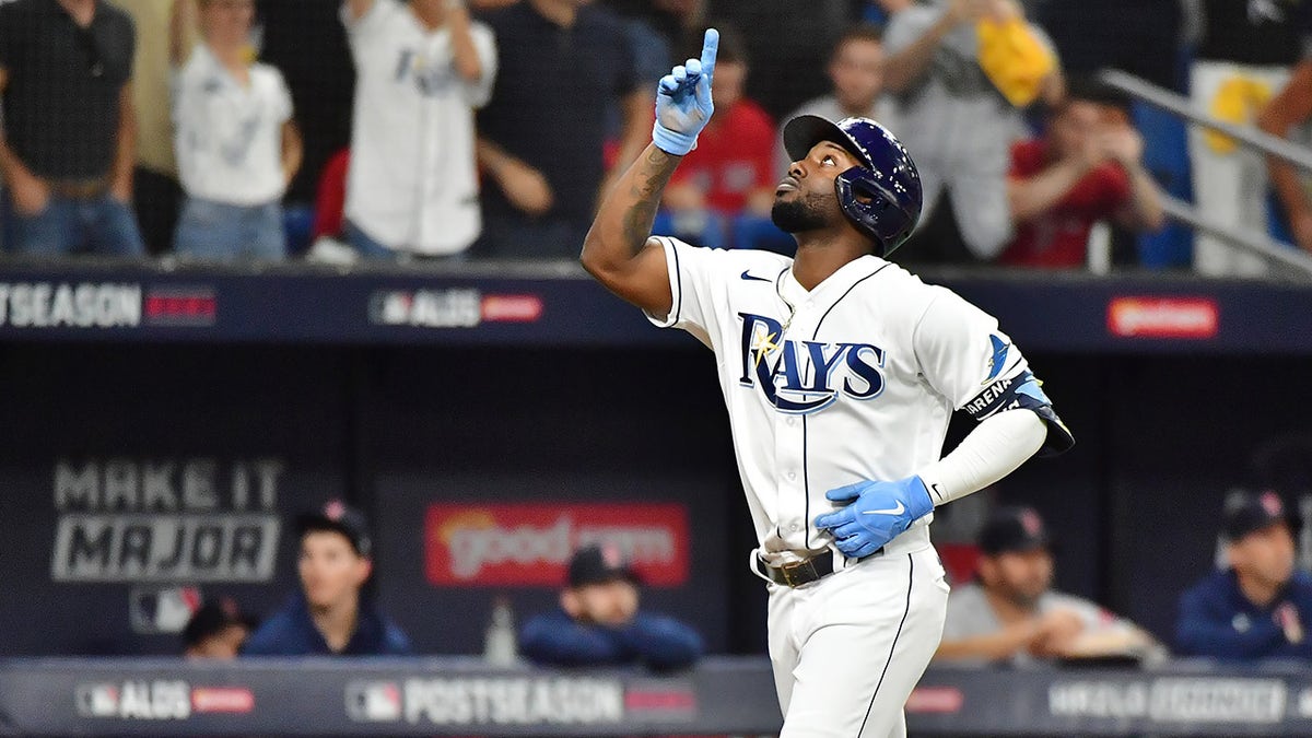 Randy Arozarena #56 of the Tampa Bay Rays celebrates his solo home run in the fifth inning against the Boston Red Sox during Game 1 of the American League Division Series at Tropicana Field on October 07, 2021 in St Petersburg, Florida.
