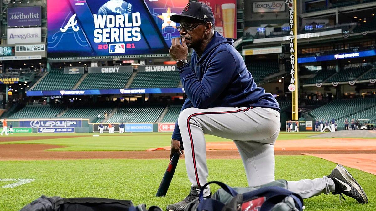 Atlanta Braves third base coach Ron Washington watches during batting practice before Game 1 in baseball's World Series against the Houston Astros Tuesday, Oct. 26, 2021, in Houston.