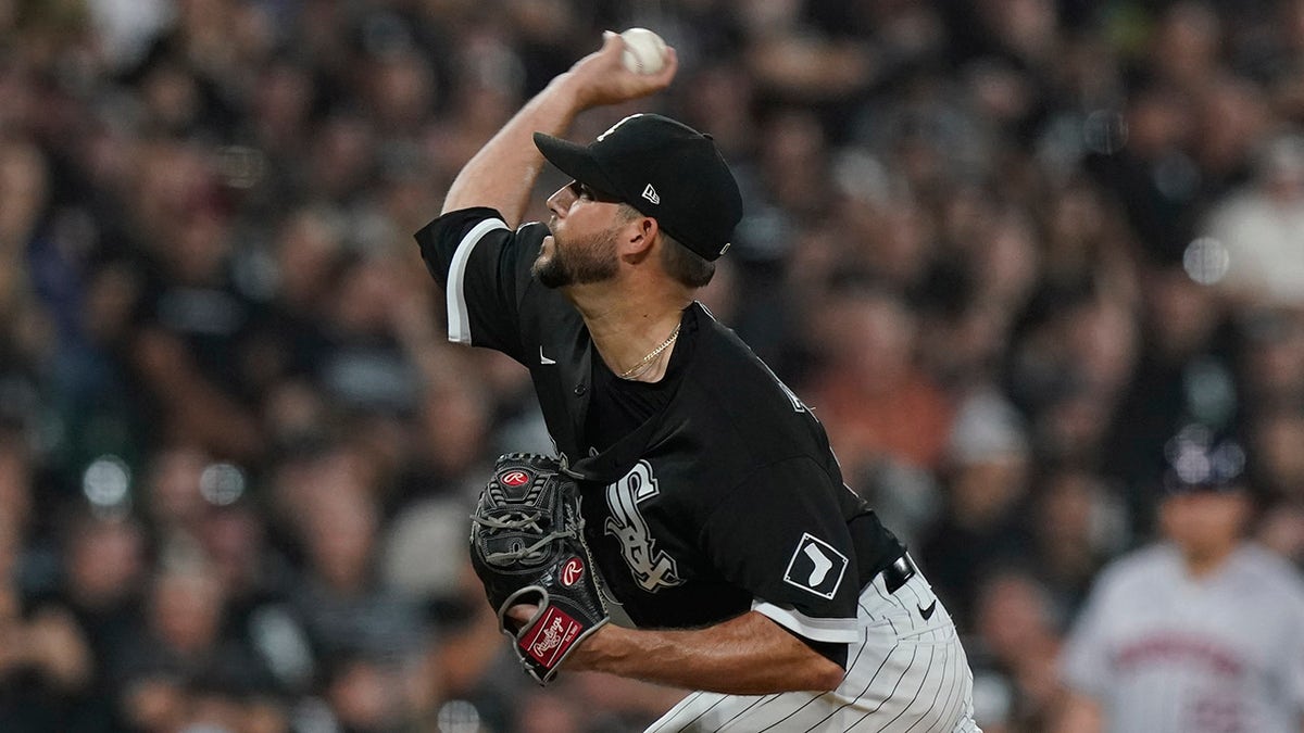 Chicago White Sox relief pitcher Ryan Tepera throws in the fifth inning against the Houston Astros during Game 3 of a baseball American League Division Series Sunday, Oct. 10, 2021, in Chicago.