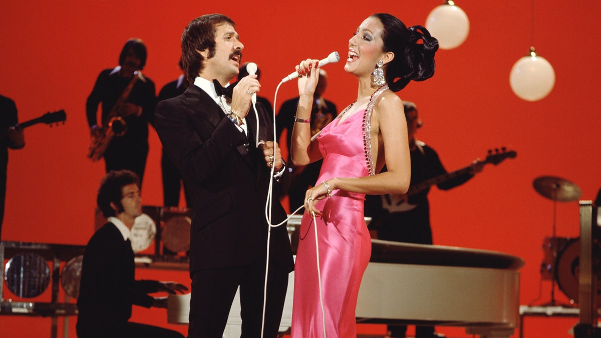 Photo of Sonny Bono and Cher singing