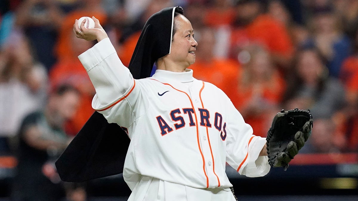 Oct 22, 2021; Houston, Texas, USA; A nun throws out the first pitch of game six during the 2021 ALCS between the Boston Red Sox and the Houston Astros at Minute Maid Park.