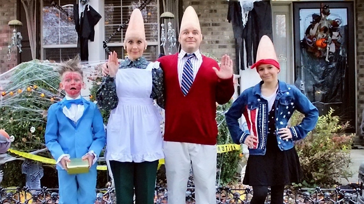 The St. Laurent family is pictured dressed up as characters from "Coneheads." (SWNS)