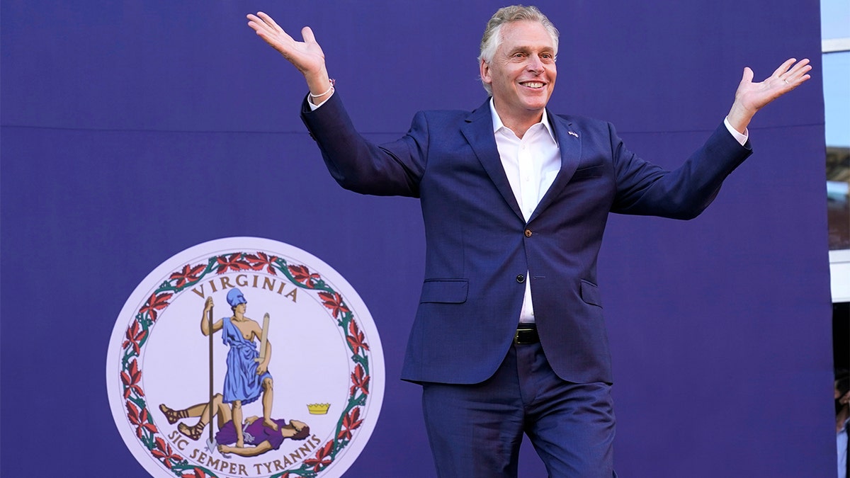 Democratic gubernatorial candidate, former Virginia Gov. Terry McAuliffe arrives for a rally in Richmond, Va., Saturday, Oct. 23, 2021. McAuliffe will face Republican Glenn Youngkin in the November election. (AP Photo/Steve Helber)