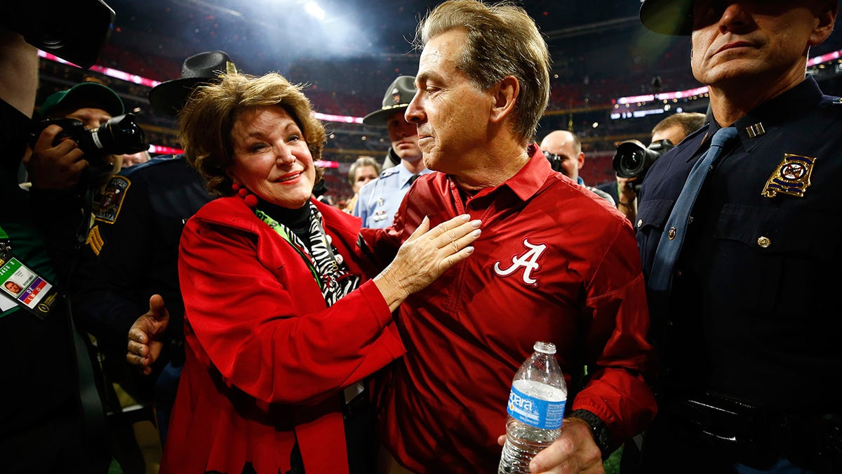 Head coach Nick Saban of the Alabama Crimson Tide celebrates with his wife Terry after beating the Georgia Bulldogs in overtime to win the CFP National Championship presented by AT&T at Mercedes-Benz Stadium on Jan. 8, 2018 in Atlanta, Georgia. Alabama won 26-23.