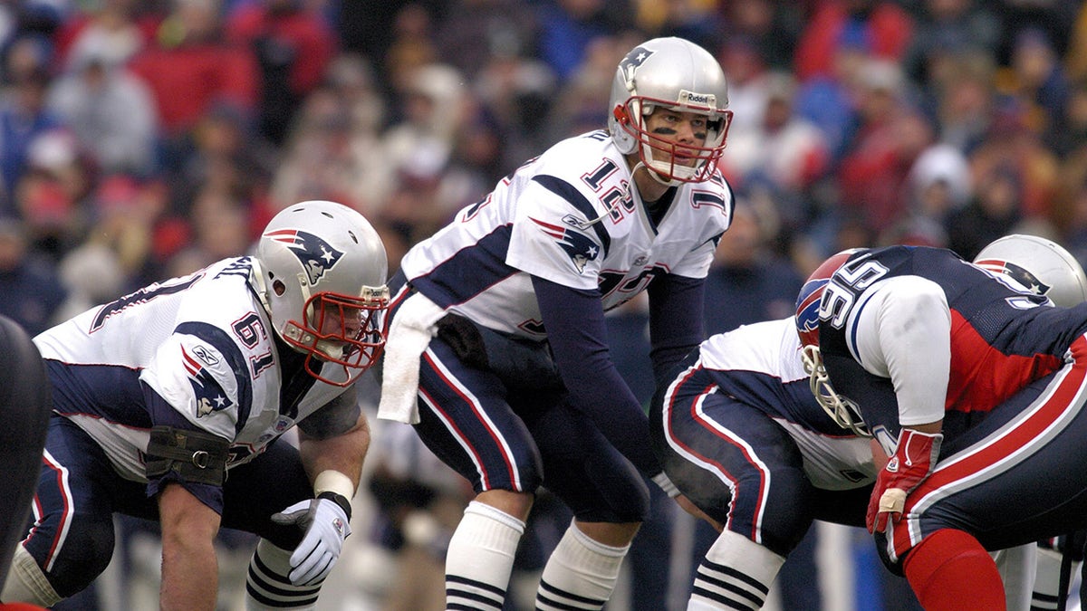 New England Patriots quarterback Tom Brady calls out signals at the line during a game against the Buffalo Bills at Ralph Wilson Stadium in Orchard Park, New York on December 11, 2005. New England won the game 35-7.