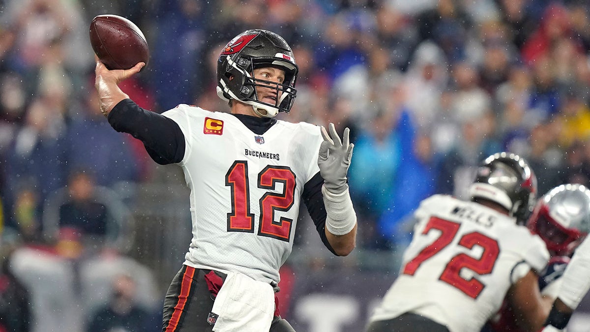 Tampa Bay Buccaneers quarterback Tom Brady (12) throws during the first half of an NFL football game against the New England Patriots, Sunday, Oct. 3, 2021, in Foxborough, Mass.