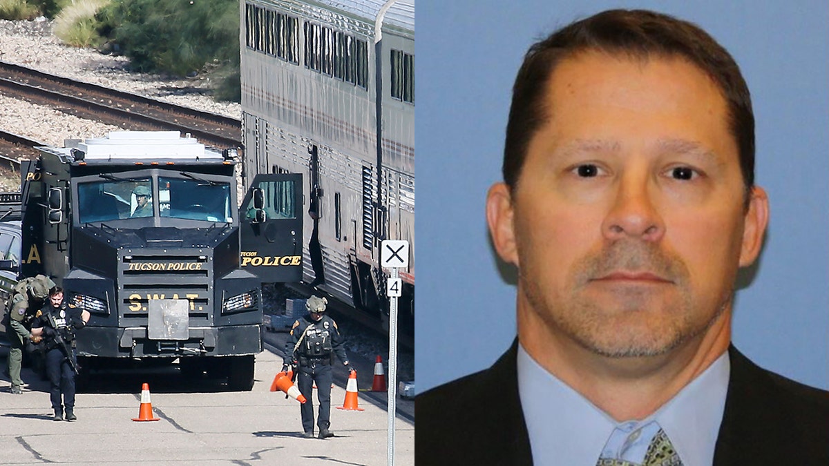 A Tucson Police Department SWAT truck is parked near the last two cars of an Amtrak train in Tucson, Arizona, Monday after a shooting left DEA agent Michael "Mike" Garbo dead (Associated Press, DEA)