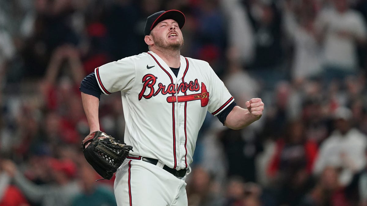 Atlanta Braves pitcher Tyler Matzek reacts after striking out Los Angeles Dodgers' Mookie Betts to end the seventh inning in Game 6 of baseball's National League Championship Series Saturday, Oct. 23, 2021, in Atlanta.