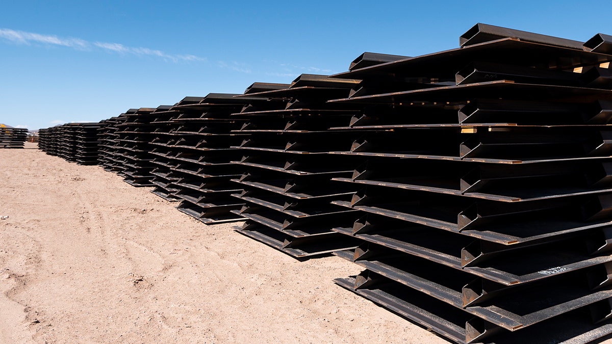 Piles of unused border fence sit at one of the border wall construction staging areas on the Johnson Ranch near Columbus, New Mexico, on April 12, 2021.