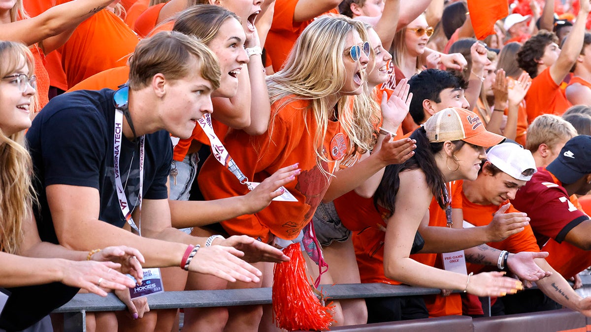 Sep 3, 2021; Blacksburg, Virginia, USA;  Virginia Tech Hokies fans cheer during the second quarter against the North Carolina Tar Heels at Lane Stadium.