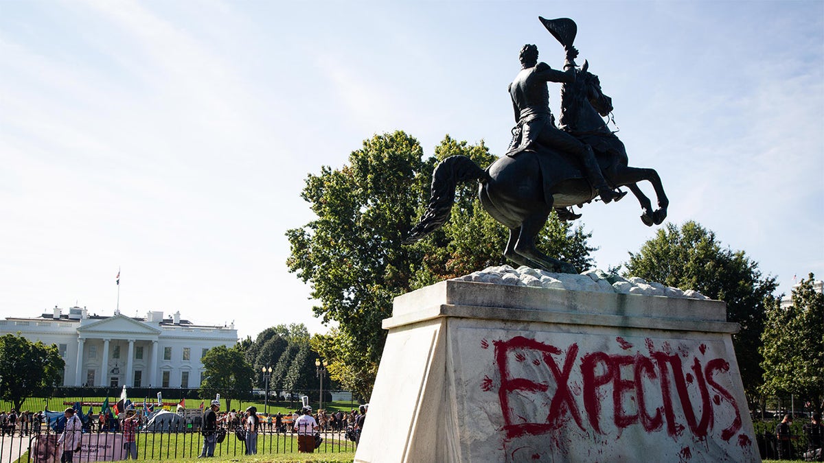 A statue of Andrew Jackson is pictured with graffiti on it saying "expect us" during the week of climate protests. (Photo by Karla Cote / SOPA Images/Sipa USA)No Use Germany.