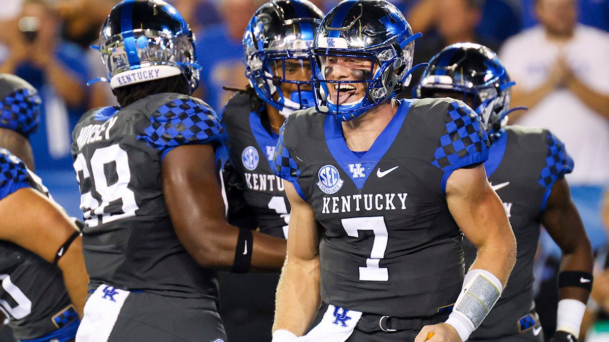 Kentucky quarterback Will Levis (7) celebrates a touchdown during the first half of the team's NCAA college football game against LSU in Lexington, Ky., Saturday, Oct. 9, 2021.