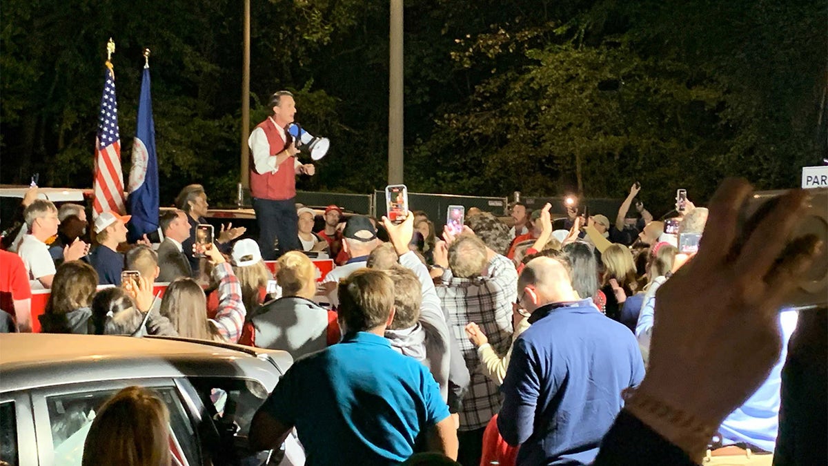 Glenn Youngkin speaks to supporters outside after his speech.