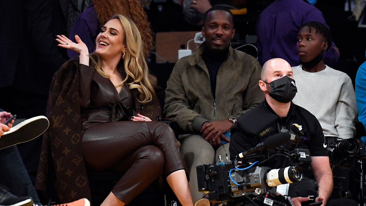 Adele told Vogue she "just loves being around" Paul.