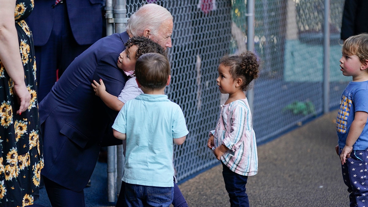 President Joe Biden greets children as he visits the Capitol Child Development Center, Friday, Oct. 15, 2021, in Hartford, Conn. 