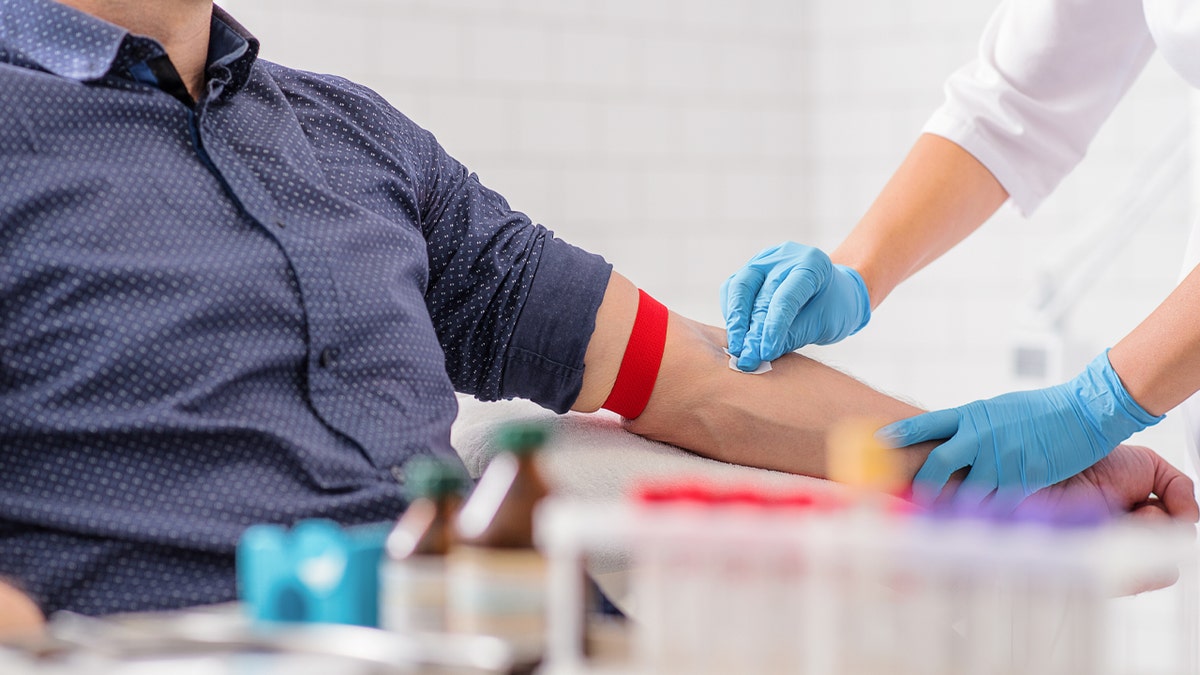 man donates blood