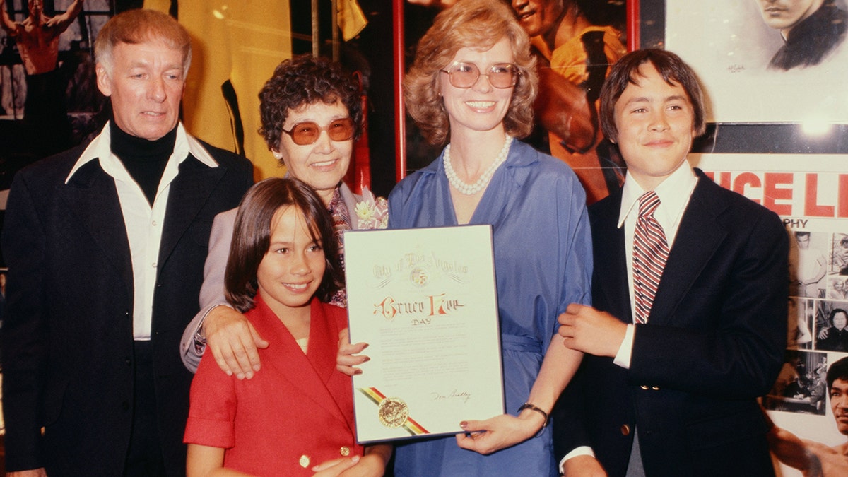 Bruce Lee's mother, wife Linda, children Brandon and Shannon celebrate Bruce Lee Day circa 1979 in Los Angeles California. Brandon died at the age of 28 on set of ‘The Crow’ in 1993 after he was fatally shot with an improperly loaded prop gun.