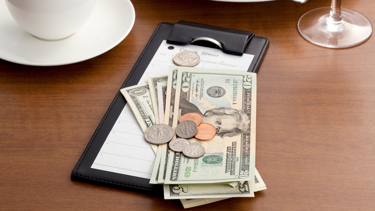 In total, Songer made about $1,258 in tips, plus the $50 for a photoshoot, in one week earlier this year. (iStock)