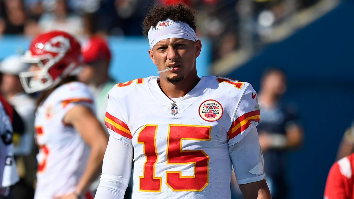 Kansas City Chiefs quarterback Patrick Mahomes (15) walks on the sideline after leaving the medical tent following a hard hit in the second half of an NFL football game against the Tennessee Titans Sunday, Oct. 24, 2021, in Nashville, Tenn. 