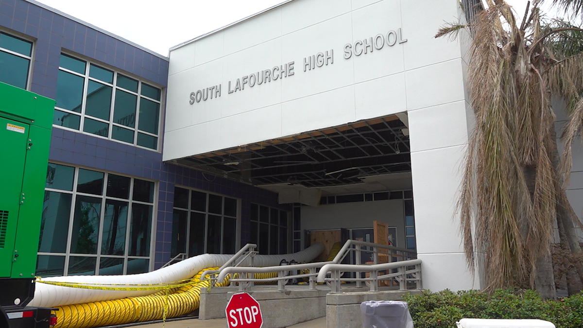 Dehumidifiers are running daily to dry the building after major flooding. 