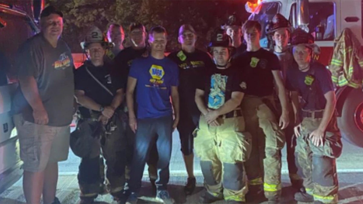 Members of the Duncannon Fire Company posed with Kahne before receiving news that two of the victims had died.