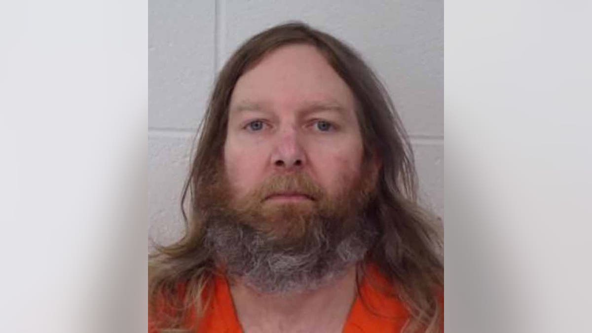 Jeffrey Burnham was wanted in the deaths of his brother, sister-in-law and an elderly woman before his arrest in West Virginia. 