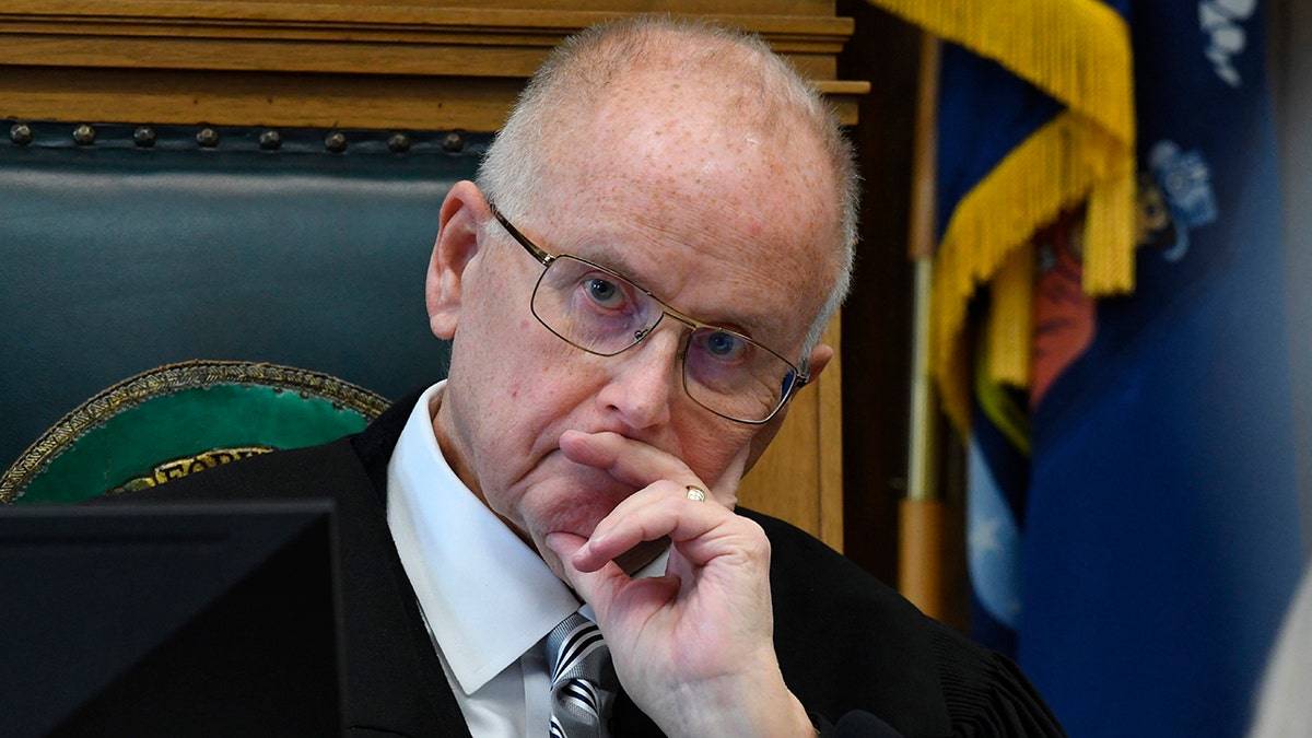 Circuit Court Judge Bruce E. Schroeder listens during the pretrial hearing of Kyle Rittenhouse in Kenosha Circuit Court on Monday in Kenosha, Wisconsin.