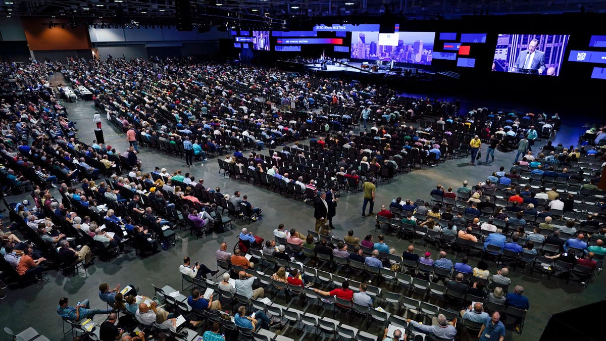 In this June 16, 2021, file photo, people attend the morning session of the Southern Baptist Convention annual meeting in Nashville, Tennessee. (AP Photo/Mark Humphrey, File)
