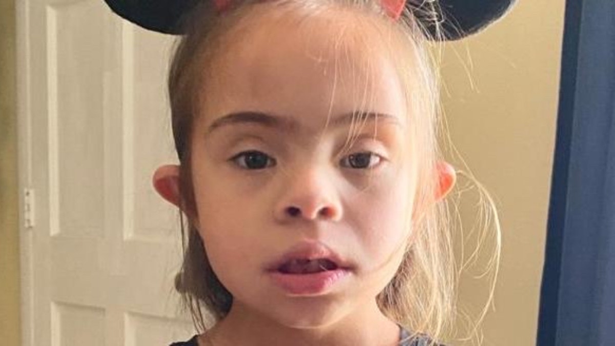 A Florida father is accusing educators at his daughter's elementary school of forcing his daughter with Down syndrome to wear a mask by tying it to her head for about six weeks. (Credit: Jeffrey Steel)