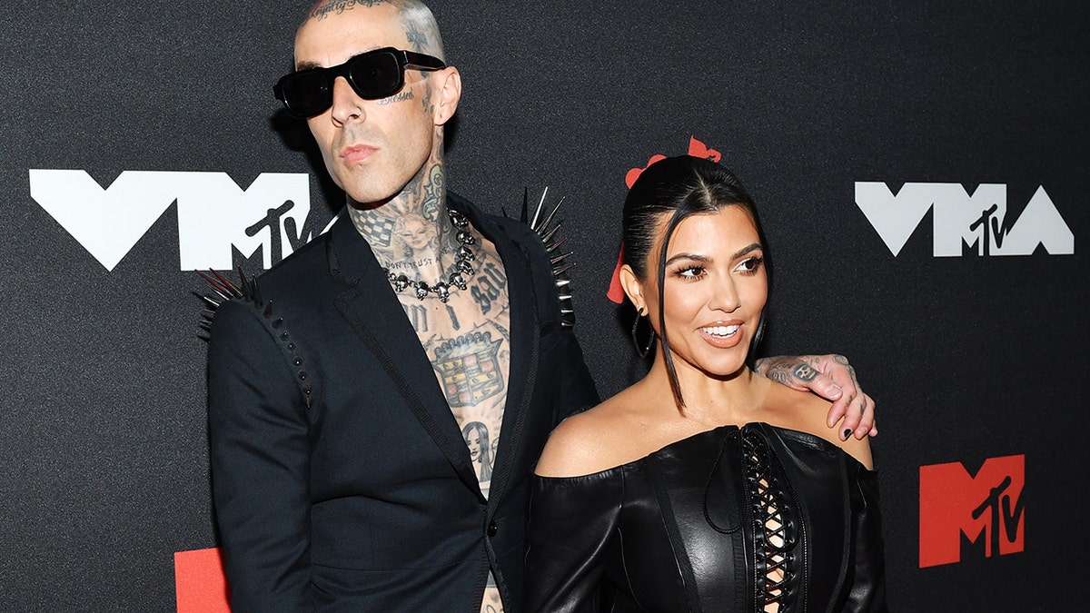 Kourtney Kardashian shared photos of her impromptu wedding to Travis Barker on Instagram.