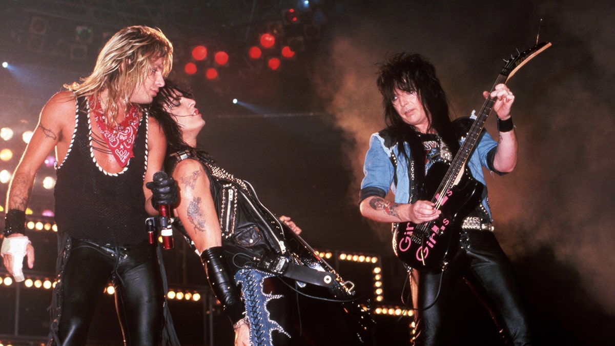 Mötley Crüe lead singer Vince Neil, co-founder and bass player Nikki Sixx and guitarist Mick Mars perform onstage at the Joe Louis Arena, on July 20, 1987, in Detroit, Michigan.