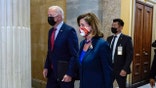 President Joe Biden walks with House Speaker Nancy Pelosi of Calif., on Capitol Hill in Washington, Friday, Oct. 1, 2021, for a meeting with the House Democratic caucus to try to resolve an impasse around the bipartisan infrastructure bill. (AP Photo/Susan Walsh)