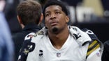 New Orleans Saints quarterback Jameis Winston (2) is carted off the field after being injured from a horse collar tackle in the first half of an NFL football game against the Tampa Bay Buccaneers in New Orleans, Sunday, Oct. 31, 2021.