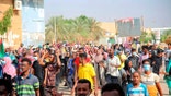 Thousands of pro-democracy protesters take to the streets to condemn a takeover by military officials in Khartoum, Sudan, Monday Oct. 25, 2021. Sudan’s military seized power Monday, dissolving the transitional government hours after troops arrested the acting prime minister and other officials. The takeover comes more than two years after protesters forced the ouster of longtime autocrat Omar al-Bashir and just weeks before the military was expected to hand the leadership of the council that runs the African country over to civilians. (AP Photo/Ashraf Idris)