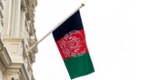 The flag of Afghanistan flying on the Embassy of the Islamic Republic of Afghanistan in London.