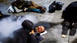 Four homeless men including Larry Gaspar, 66 (left) sleep on Larkin Street in San Francisco, California, on Tuesday, June 18, 2019.   Photo taken on the corner of Larkin Street and McAllister Street at 10:27pm. (Photo by Gabrielle Lurie/San Francisco Chronicle via Getty Images)
