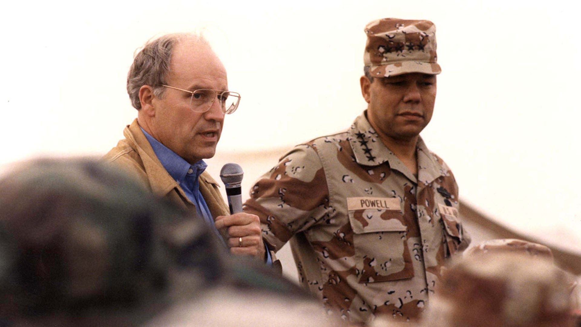 Richard Cheney, U.S. Defense Secretary during the Gulf War, and then Chairman of the Armed Forces Joint Chiefs of Staff, Colin Powell (R), address U.S. troops deployed in Saudi Arabia as part of operation Desert Shield during the Gulf crisis, in a December 21, 1990 file photo. According to reports, Republican presidential candidate George W. Bush decided on July 24, 2000 to offer the vice presidential spot on the Republican White House ticket to Cheney. Senior Republican sources in Washington said Bush would call Cheney soon and appear with him July 25. Cheney had previously told associates that if asked, he would accept the nomination. Bush had also been courting Powell for the Vice President's job, but Powell said he was not interested. HB/