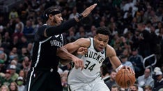 Bucks begin title defense with 127-104 victory over Nets