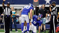 Giants' Daniel Jones wobbly after helmet-to-helmet play, leaves field on cart