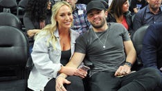 Baker Mayfield's wife sounds off on the 'weirdest' year following Panthers release