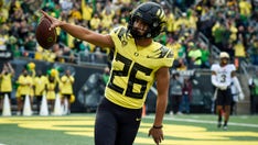 Brown throws for 3 TDS and No. 7 Oregon downs Colorado 52-29