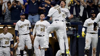 Tellez HR, throw spark Brewers over Braves 2-1 in Game 1