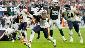 Fields throws 1st TD pass, Chicago's defense dominates Vegas