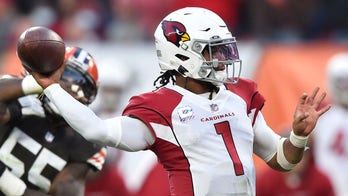 Murray throws 4 TD passes, unbeaten Cardinals batter Browns