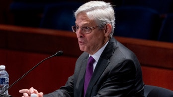 Garland says DOJ 'does not support defunding the police,' asked for $1B increase in funds