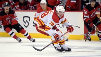 Flames use 4-goal outburst in 1st period to beat Devils 5-3