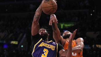 Lakers stars grapple with each other, fans during loss to Suns