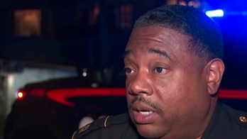 Intruder who entered home and grabbed kitchen knives shot by homeowner