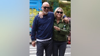 Chelsea Handler and boyfriend Jo Koy are all loved up during NYC stroll