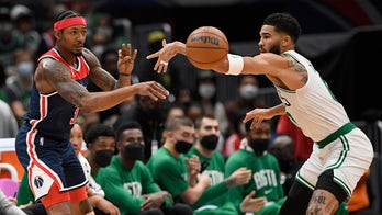 Beal, Dinwiddie lead Wizards past Celtics, 115-112 in 2 OTs